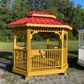 7x9 Tea House Gazebo. Canyon Brown Stained and Sealed.. Included Double Roof ,Swing Drink Holder Shelves and Bench.