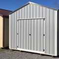 A gray, white, and charcoal metal gable style with windows in the side