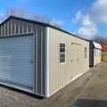 12x24 Classic Metal Utility Shed. Clay Walls Polar White Trim and Bronze Metal Roof. Options Include 80" Double Doors, 4' Loft 2- Windows 6' Wokbench,12' Double Shelves 8x7 Roll-up Door Foil on Roof.