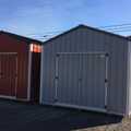 12x20 Metal Utility Shed. Light Gray Walls, Polar White Trim and Charcoal Metal Roof. Includes 80" Doors, 1 - 4' Loft, 12' Double Shelves, 2 - Windows and Fully Insulated.