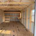12x24 Classic Metal Utility Shed. Clay Walls Polar White Trim and Bronze Metal Roof. Options Include 80" Double Doors, 4' Loft 2- Windows 6' Wokbench,12' Double Shelves 8x7 Roll-up Door Foil on Roof.