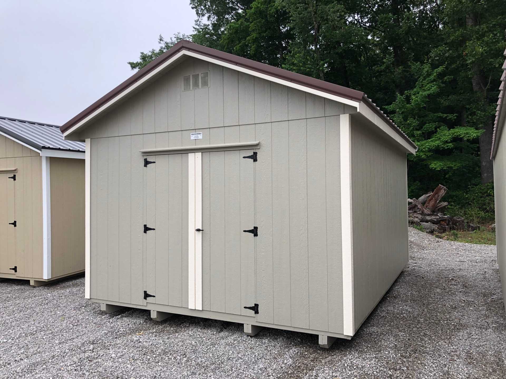 12x16 Utility Shed painted Clay with White trim and Brown metal roof